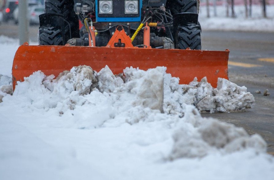 snow being removed off street in oxford ny
